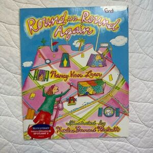 Round and Round Again by Nancy Van Laan 
Rhyming Fiction Paperback Book 1994